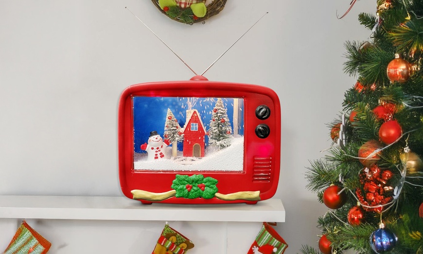 Image 1: Decoración navideña con forma de TV, con luces, música y movimiento