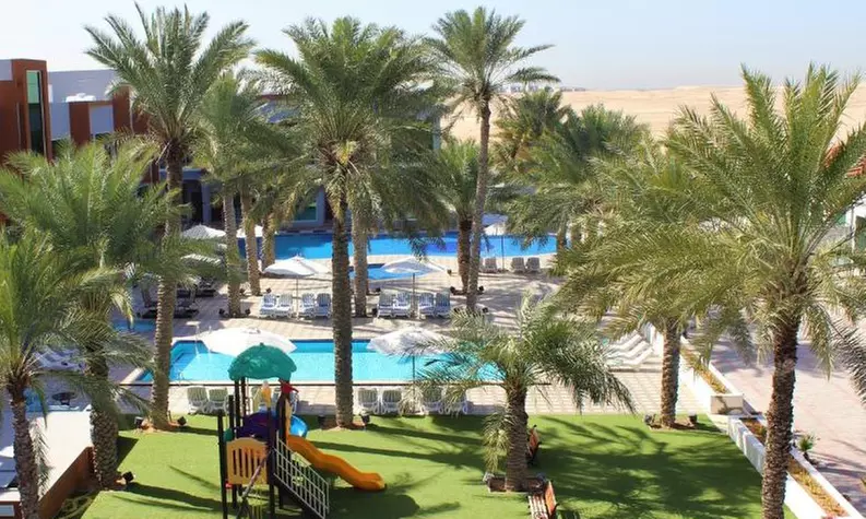 Umm Al-Quwain: One Night for Up to Six Adults with Complimentary Wi-Fi and Parking at Hotel Royal Residence - Primary Image