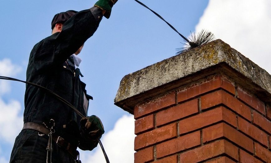 Image 2: Professional Chimney Services: Cleaning, Inspection, & Safety Checks
