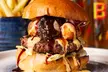 Burger & Pint Feast for Two at Walkabout Manchester Printworks – Ice-Cold Drinks & Live Sports Vibes (Up to 46% Off) - Second Medium