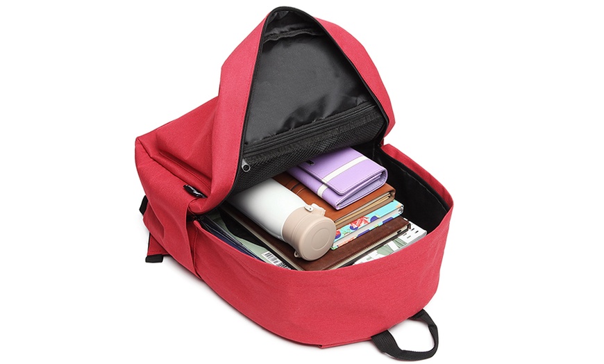 Image 26: Mochila escolar con correas acolchadas y múltiples bolsillos