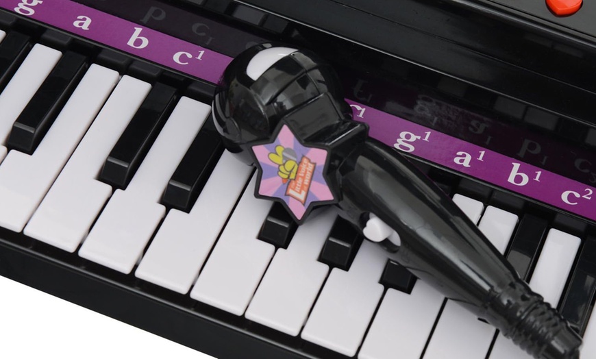 Image 4: HomCom Kids' Mini Electronic Keyboard selection
