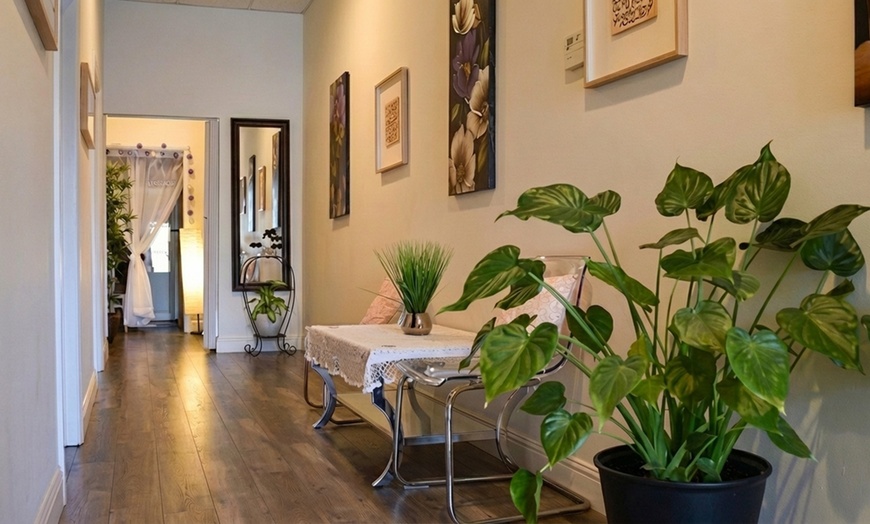 Image 5: 50/75-Min Thai, Swedish, or Deep Tissue Massage w/ Cupping or Reiki