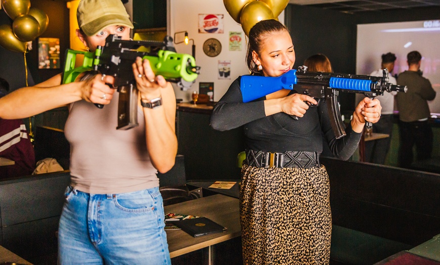 Image 1: Shooting Simulator Thrill with Drinks for 2 or 4 Guests