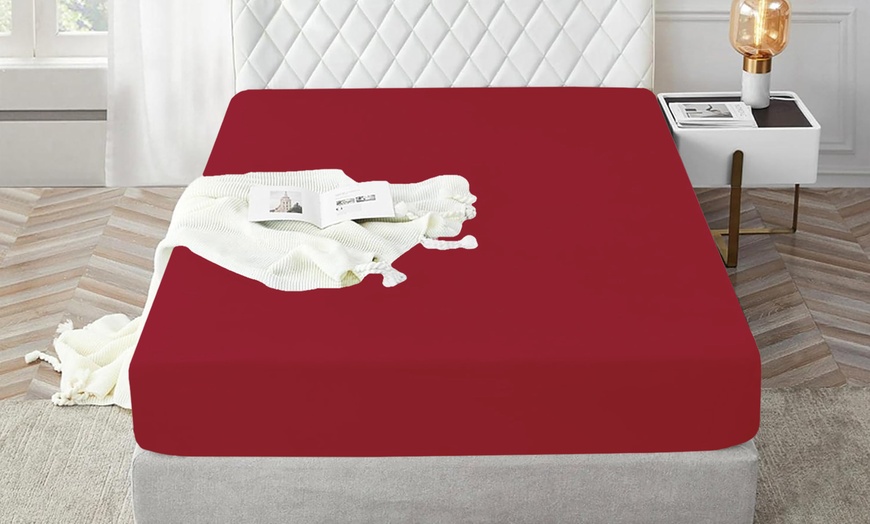 Image 9: Sábana bajera con esquinas