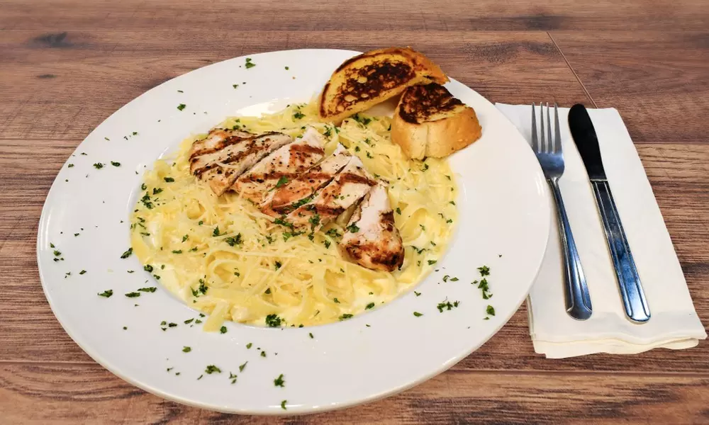 Food and Drink Credit Worth $40 or $80 at a Lively Poker Venue 