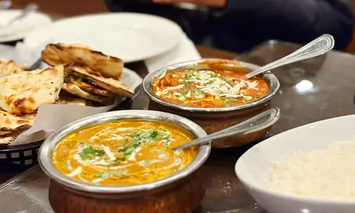 $25 or $50 Toward Food and Drink Or Dinner with Drink for Two/Four
