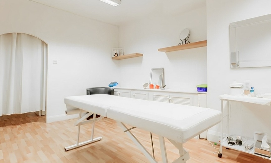 Image 1: 1 or 3 Sessions: 60 or 90 Min Massage of Choice with Facial