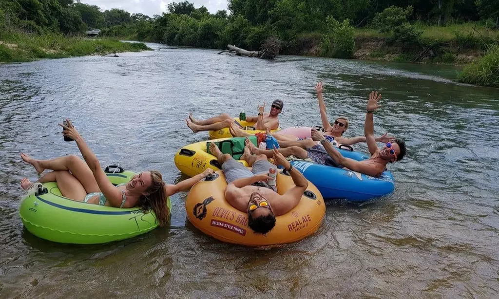 Enjoy a Hassle-Free Tubing Adventure w/ Transportation & Cooler Setup 
