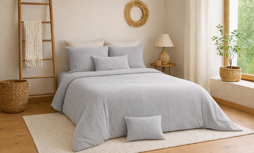 Image 16: Completo lenzuola matrimoniale in tinta unita 100% cotone