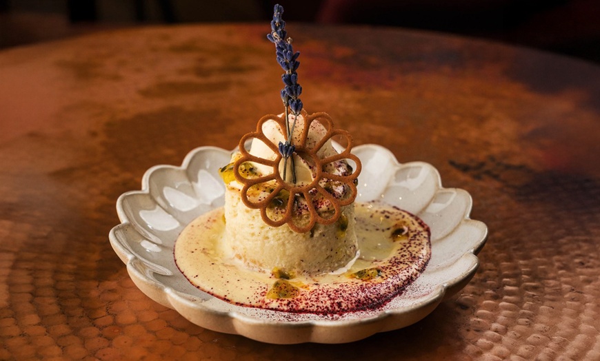 Image 11: Three-Course Dinners or Dining Credits at a NYC Wine Lounge