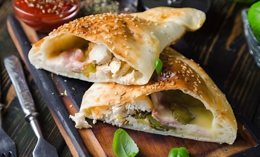 Image 5: $15, 30 or 50 Towards Food & Drinks, 1 Large Specialty Pizza and More