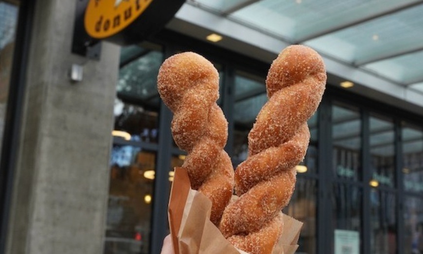 Image 14: Up to a Dozen Donuts, 4 Donuts & 2 Drinks or $50 to Spend