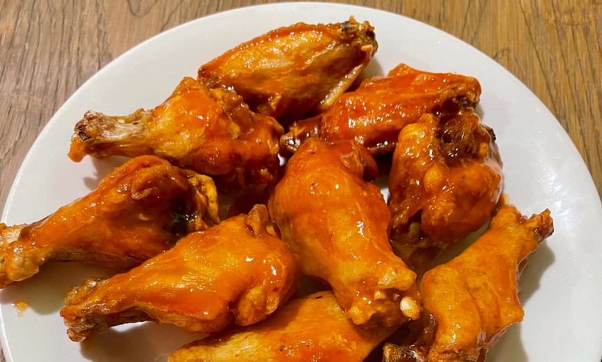 Image 2: Choose a Large Cheese Pizza or Pizza Combo with Wings & Garlic Bread