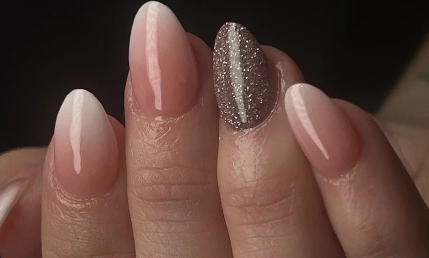 Image 4: Relax with a 30-Min Deluxe Mani / 45-Min Deluxe Pedi, & More