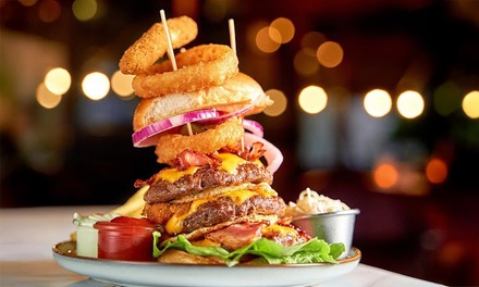 Für 1 Person: Reichhaltiger Burger nach Wahl inklusive Pommes & je ein Softdrink - Café And Restaurant Prinz