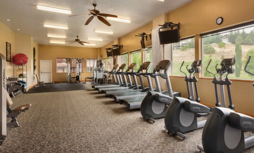 Image 7: Cozy alpine rooms, heated pool, and mountain views