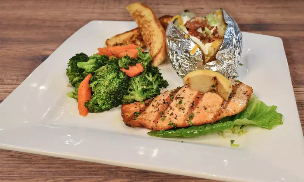 Food and Drink Credit Worth $40 or $80 at a Lively Poker Venue 
