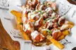 Satisfy Cravings with $25, $50, $75 or $100 Dining Credit at Hangry Belly ( Up to 42% Off ) - Second Medium