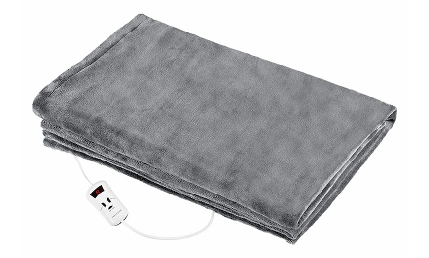 Image 5: Restez au chaud avec un coussin ou une couverture chauffante