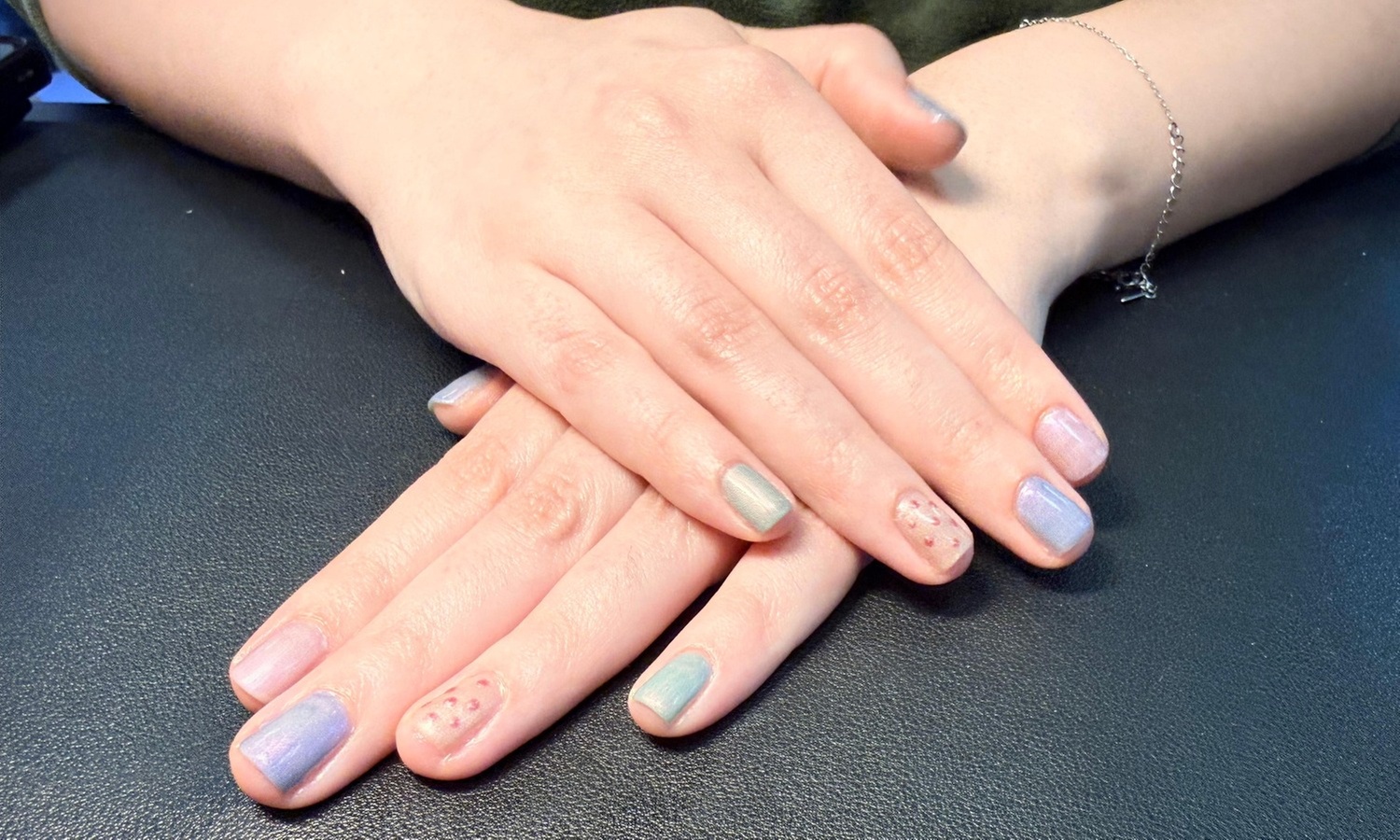 One Luxury Manicure and/or Pedicure