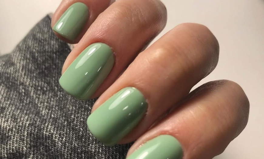 Image 3: Relax with a Deluxe Manicure and Pedicure Experience!