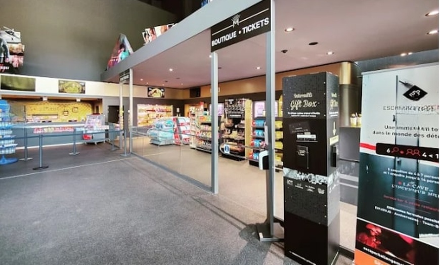 Image 3: Une place de cinéma avec popcorn pour découvrir les films du moment