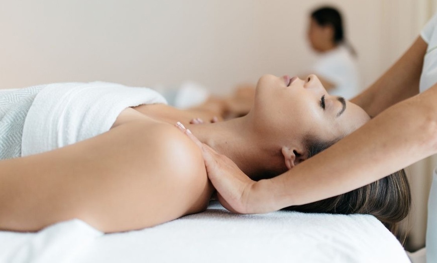 Image 1: 60-Min Massage or 50-Min Facial With Facilities Access