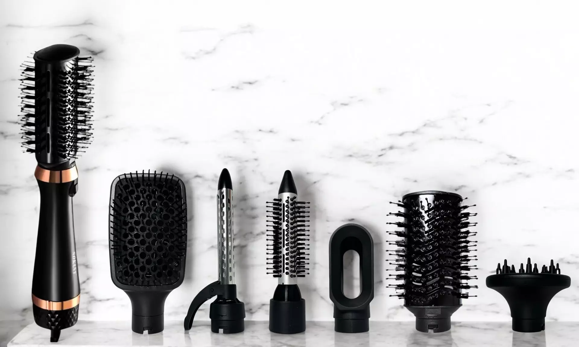 Brosse à cheveux multifonctionnelle avec 7 embouts différents - Primary Image