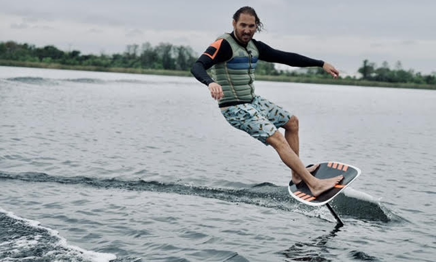 Image 2: Catch Waves with Exclusive Wakesurfing or Waterboarding Lessons
