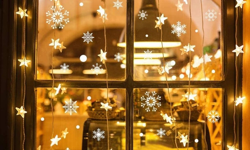 Image 9: Four or Eight Pieces Christmas Window Stickers - Style 1 or 2 