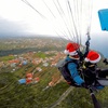 Image 1: Vuelo estándar o acrobático en parapente con video del despegue 