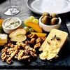 Image 1: Unforgettable Wine and Cheese Tasting with Optional Charcuterie Awaits