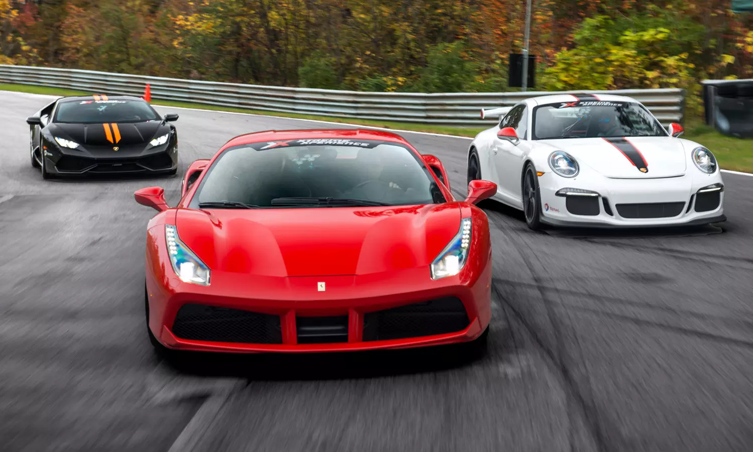 Drive a Ferrari, Lamborghini, Porsche and more on a Racetrack with no speed limits (Up to 32% Off).  - Primary Image