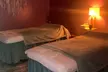 Relaxation, Deep Tissue, Sports, Back-Walking, or Hot Stone Massage OR CBG+CBD Therapy (Up to 38% Off) - Second Medium