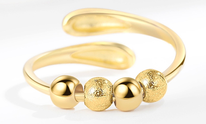 Image 8: 2x Elegante Spinner-Ringe mit drehbaren Perlen zur Entspannung