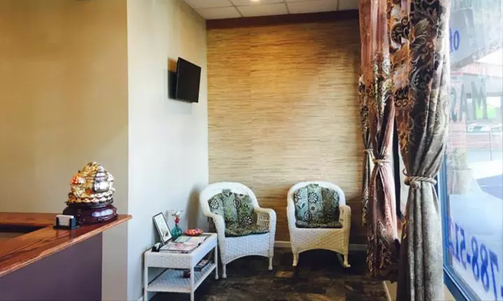 Relax with a 90-Minute Solo or Couples Massage, CBD Oil, & Hot Stones