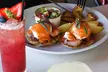 Unwind and Indulge: $25 or $55 Towards Food and Drink or Two Entrees and a Bottle of Wine ( Up to 31% Off ) - Second Medium