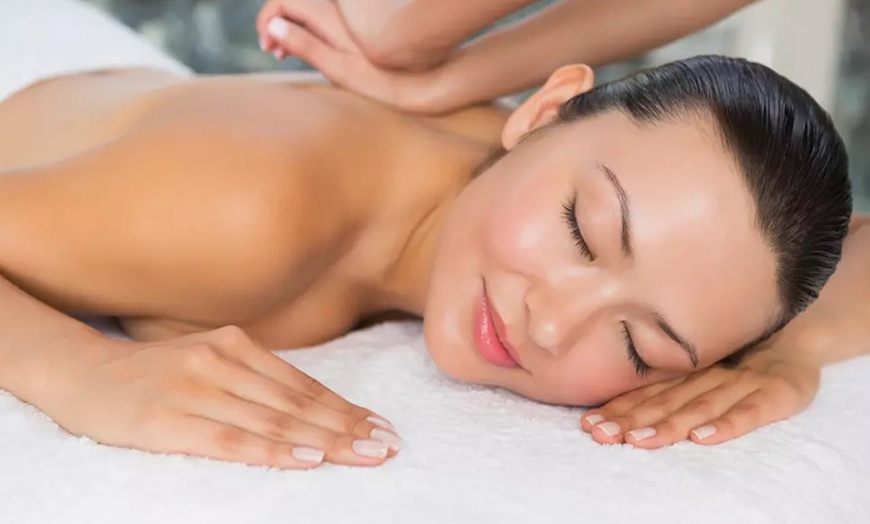 Image 1:  60 or 90 Min Massage Plus Hot Stones, Foot Scrub, Aromatherapy & More