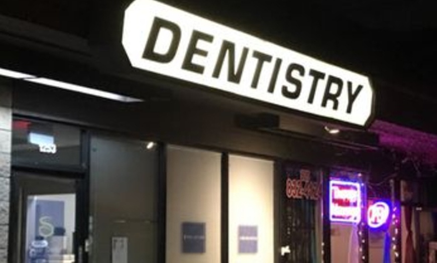 Image 1: Dental Exam, Teeth Whitening, Membership, X-ray/Implant Package & More