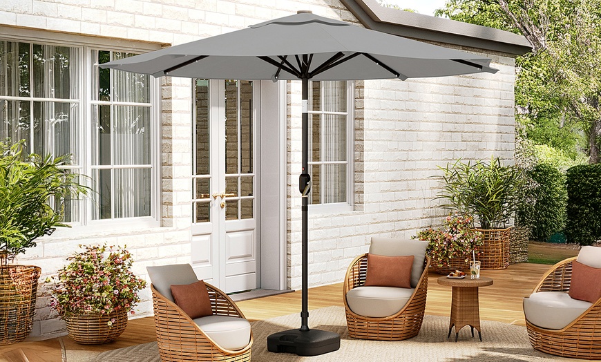 Image 8: Rotatable Solar Lighting Garden Umbrella with Fillable Base