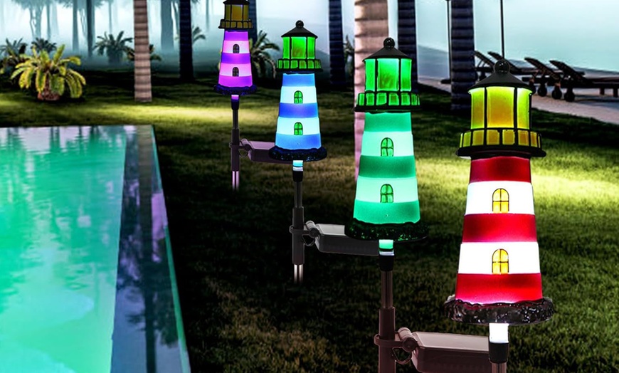 Image 5: One, Two or Four Solar Powered Lighthouse Shaped Garden Lights