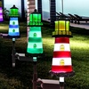 Image 5: One, Two or Four Solar Powered Lighthouse Shaped Garden Lights