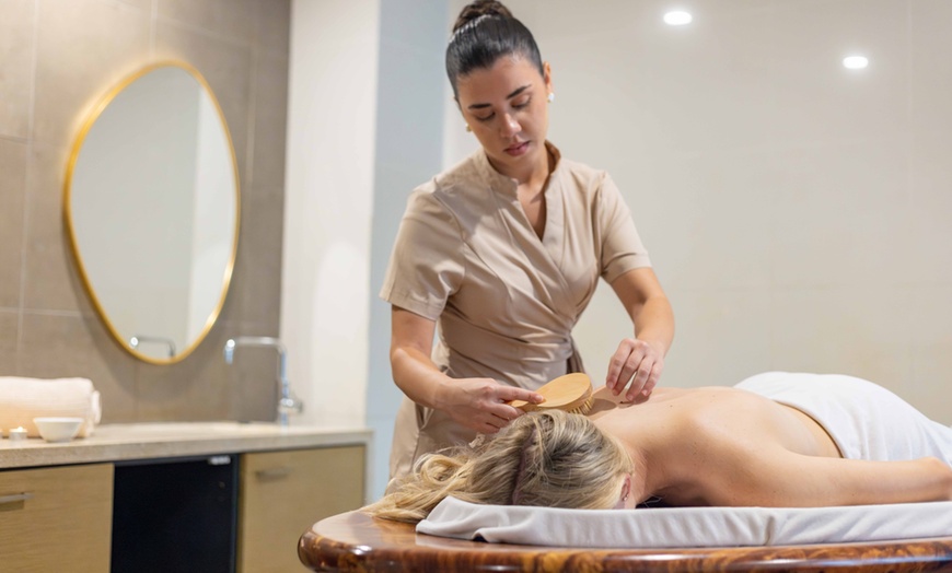 Image 1: 60-Min Massage or 90-Min Spa Package by Certified Therapists 