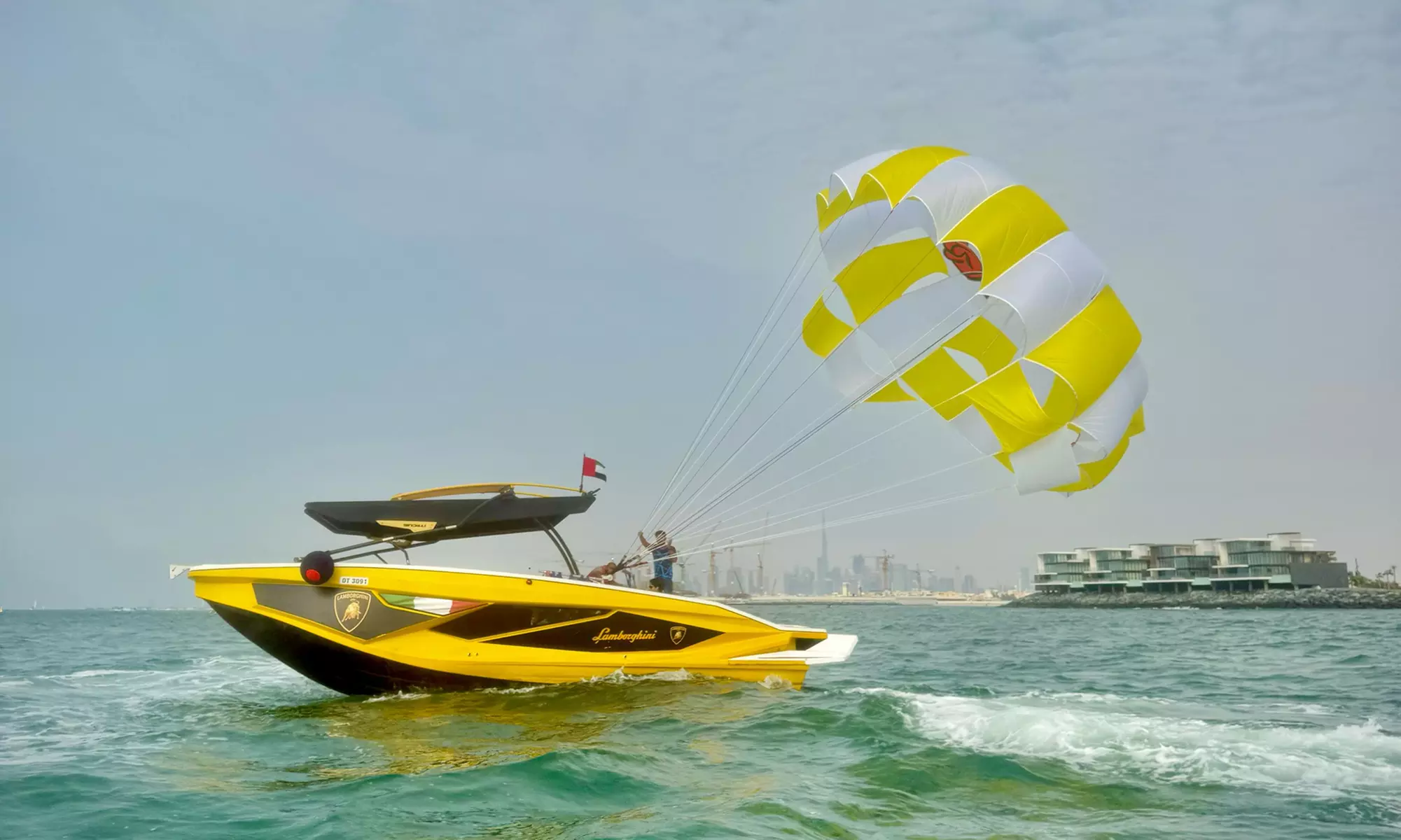 Soar Above Dubai's Coastline with 30-Minute Parasailing for One or Two