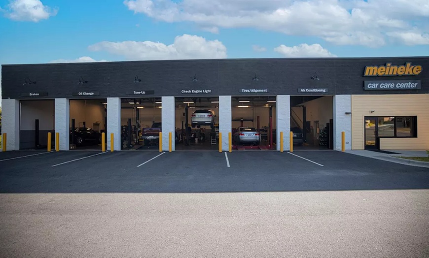 Image 1: Full Synthetic or Blend Oil Change with Tire Rotation at Meineke Auto
