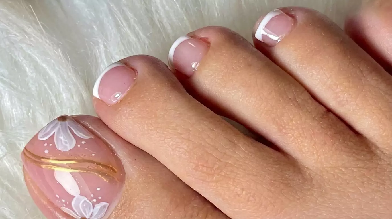 Experience Bliss with a Rejuvenating Manicure and Regular Pedicure at Oscar Nails ( Up to 33% Off )