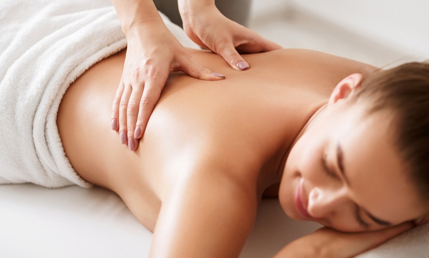 Image 1: Experience a Relaxing 50-Minute Body or Couples Massage