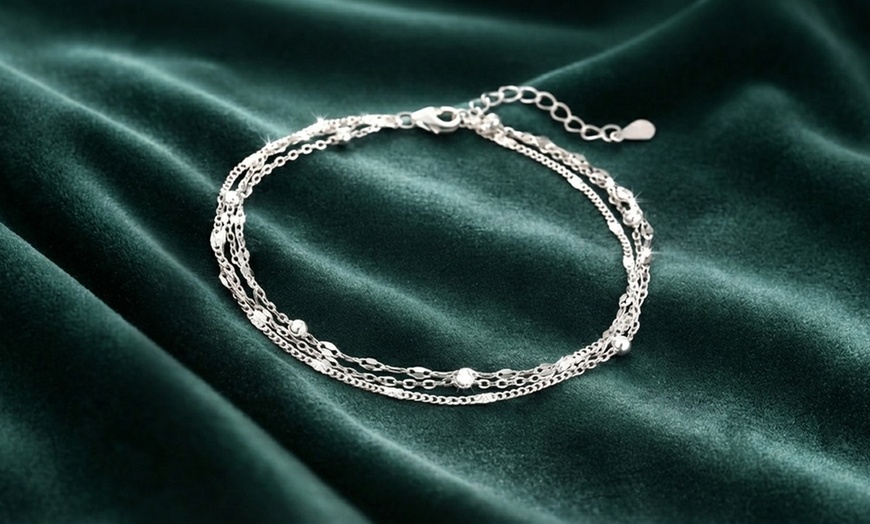 Image 9: Parure de bijoux 3 pièces : bracelet, chevillère et boucles d'oreilles