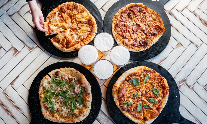 Image 1: Satisfy Your Cravings: Choice of Any Two / Four Pizzas and Drinks